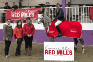 Left to right: Chantal Suarez, owner of Portmore Equestrian Centre, Niamh Harding, Jenny Crozier of Red Mills pictured with James Hogg on Interpreter, winner of HSI Connolly's Red Mills Spring Tour Round Six at Portmore Equestrian Centre (Photo Credit Grace Lavery Equestrian News NI)