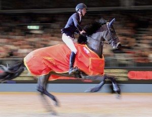 Bertram Allen and Aminko N on their lap of honour after winning the Christmas Masters at Olympia.