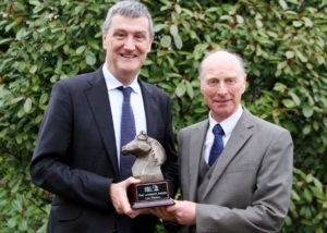 Leo Powell, managing editor of the Irish Field, accepting the Lancelot Award from AIRC chairman Tony Ennis at Racket Hall Country House Hotel, Co. Tipperary