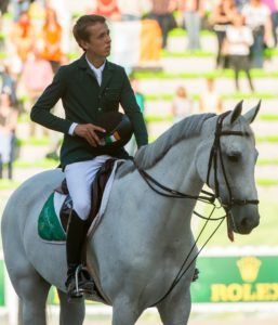 2 September 2014; Nineteen year old Bertram Allen, from Co. Wexford, who won the opening competition of The World Equestrian Games riding Molly Malone V stands to attention as the National Anthem "Amhr·n na bhFiann" is played. 2014 Alltech FEI World Equestrian Games, Caen, France. Picture credit: Ray McManus / SPORTSFILE *** NO REPRODUCTION FEE ***