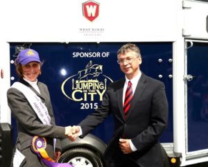  Jumping the the City Amateur Winner Joanna Penfold collects her horse box from Alan Cole of West Wood Trailers.