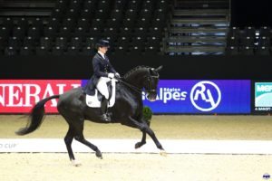 Judy Reynolds and Vancouver K achieved 77.425% in Lyon World Cup Qualifier.