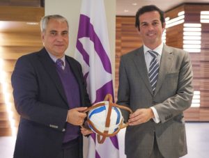 FEI President Ingmar De Vos (left) receives horseball from FIHB President Frederico Cannas (right) to commemorate the signing of the MOU at FEI Headquarters in Lausanne (SUI) today. (FEI)
