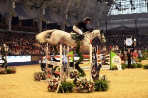 Cian O'Connor partnering Coco 11 to a second place finish in the Holly Speed Stakes at Olympia London. Photo: Helen Revington.