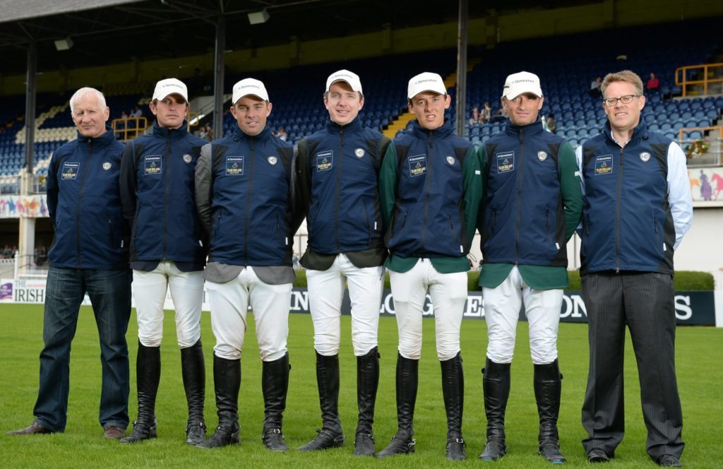 20 July 2016; Team members, from left, team manager Robert Splaine, Darragh Kenny, Cian O'Connor, Greg Broderick, Bertram Allen, Denis Lynch, with Investec's Nigel Poynton. Aga Khan Squad Photo Shoot. International Pocket, RDS, Ballsbridge, Dublin.  Photo by Cody Glenn/Sportsfile