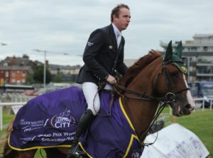 5 August 2016; Greg Broderick on Zuidam on his lap of honour after winning the The Underwriting Exchange Grand Prix during the Underwriting Exchange Jumping In the City 2016 at Shelbourne Park Greyhound Stadium in Dublin. Photo by Sam Barnes/Sportsfile *** NO REPRODUCTION FEE ***