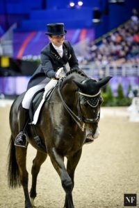 Judy Reynolds and Vancouver K leave the arena after a super World Cup Grand Prix performance in Omaha (Photo: Erin Gilmore/NoelleFloyd.com)