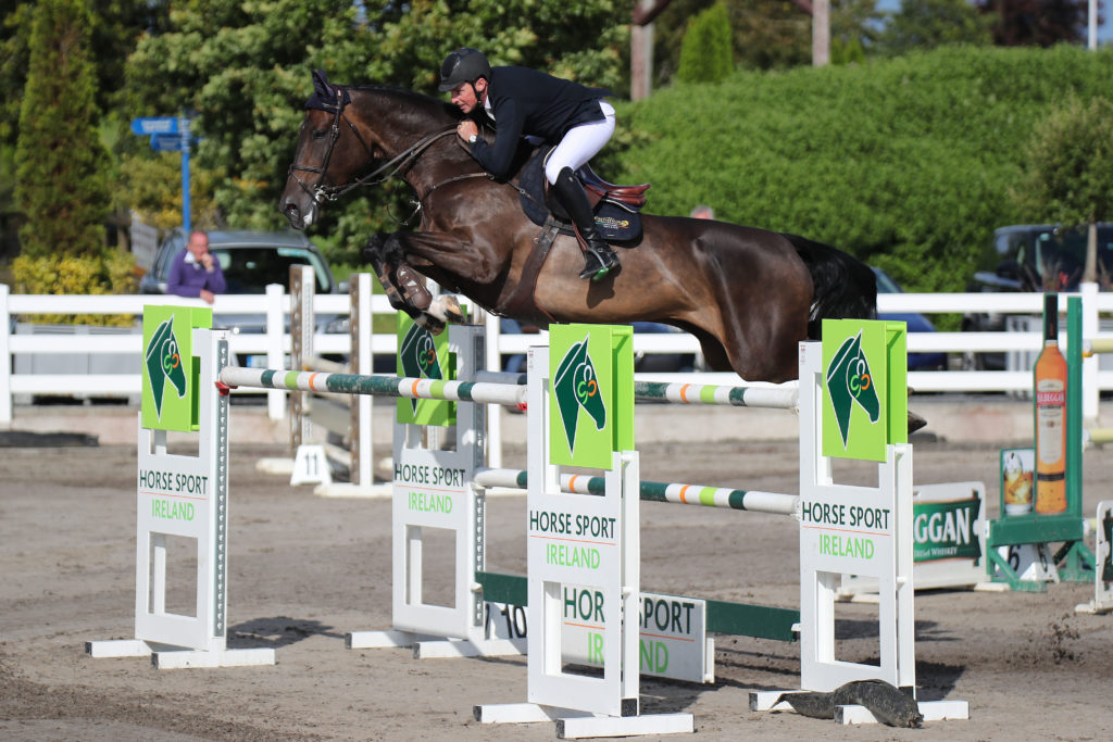 MHS High Hopes and Ger O'Neill soar over a wide oxer